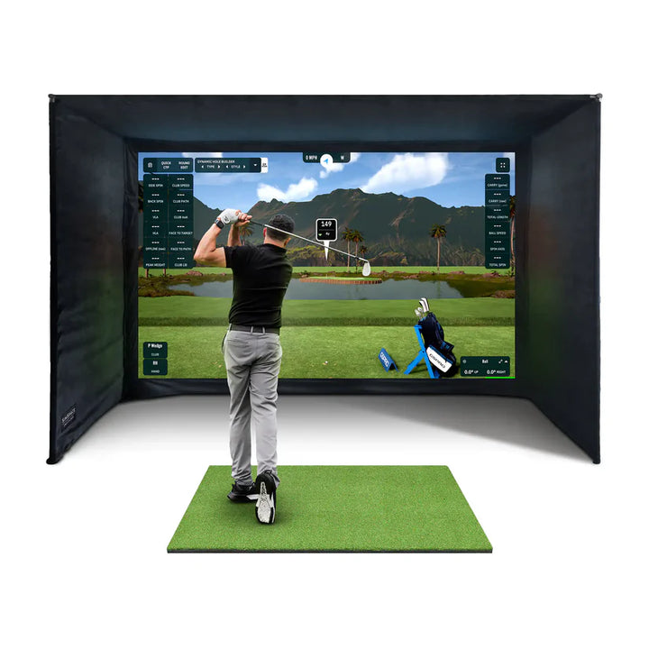 Golfer using SimSpace Golf Enclosure with 4K impact screen – premium indoor golf simulator