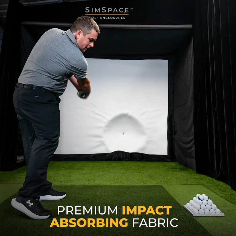 Golfer hitting into SimSpace premium impact-absorbing screen – quiet, smooth rebound and realistic play feel.