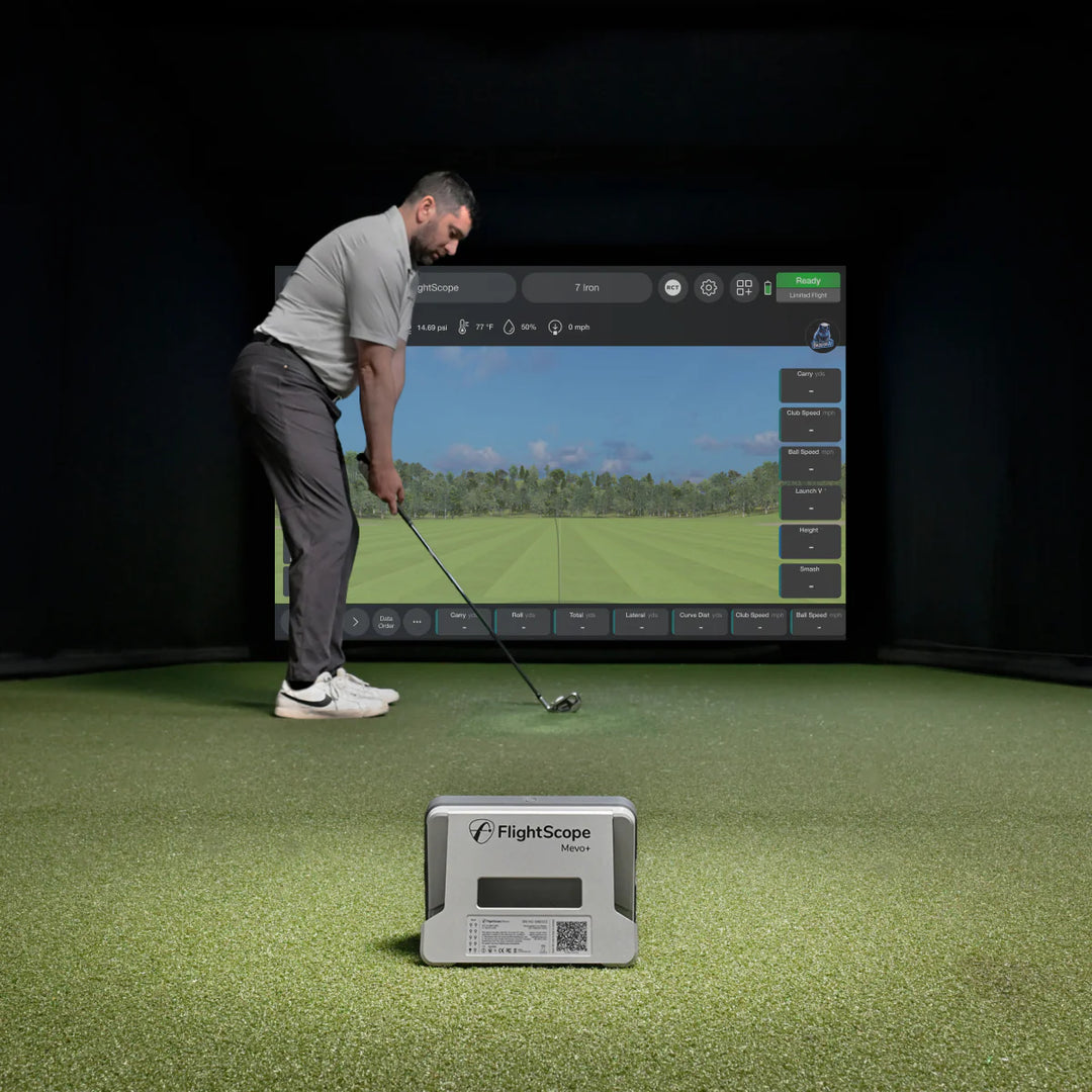 flightscope mevo plus launch monitor indoor with golfer