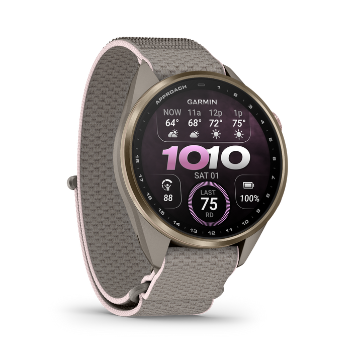 Garmin Approach S72 43 mm Soft Gold Blush Pink – three-quarter view with pink AMOLED watch face 