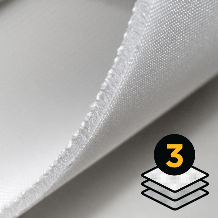 Close-up of white impact screen fabric showing its layered edge