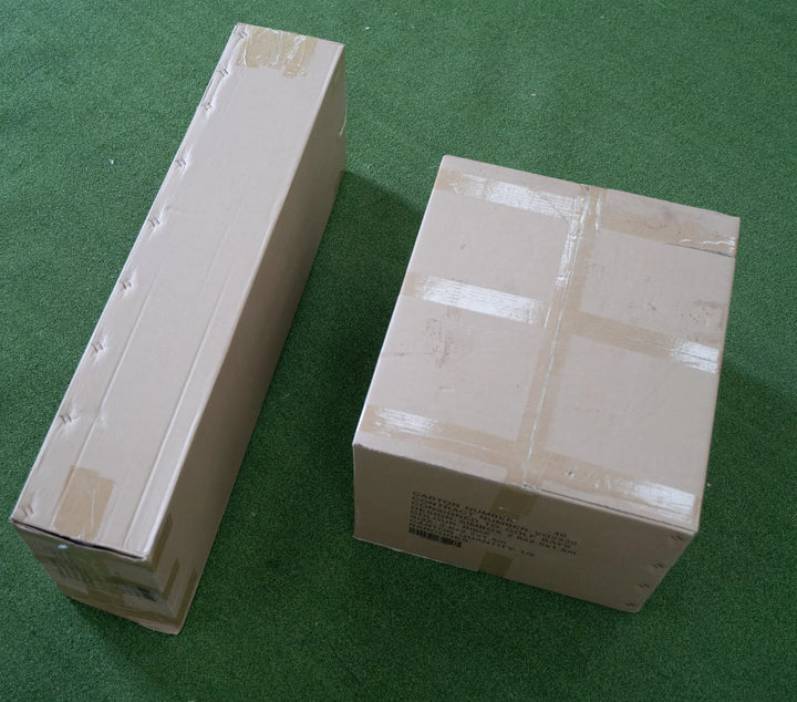 GolfBays SimBox golf simulator packaging boxes ready for delivery – available at Golf and Greens