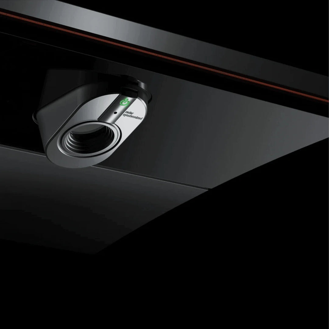 Close-up of Trackman iO golf launch monitor camera and radar system for accurate indoor ball tracking